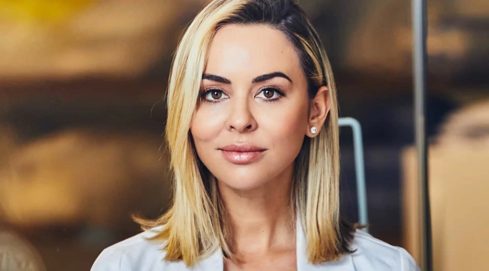 A clear-eyed portrait of Dr. Nicole Martin, where clinical authority meets self-care transparency — as profiled in RealSelf News on modern cosmetic routines.