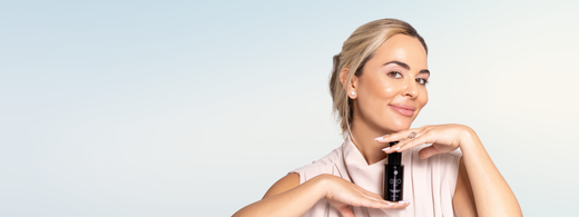 Dr. Nicole Martin, co-founder of Exoceuticals®, holding the EXO Face Perfection Moisturizer — highlighting her youth-optimizing skincare routine.