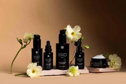 The Exoceuticals® EXO product collection styled with natural flowers — visually highlighting the brand’s use of next-generation botanical ingredients.