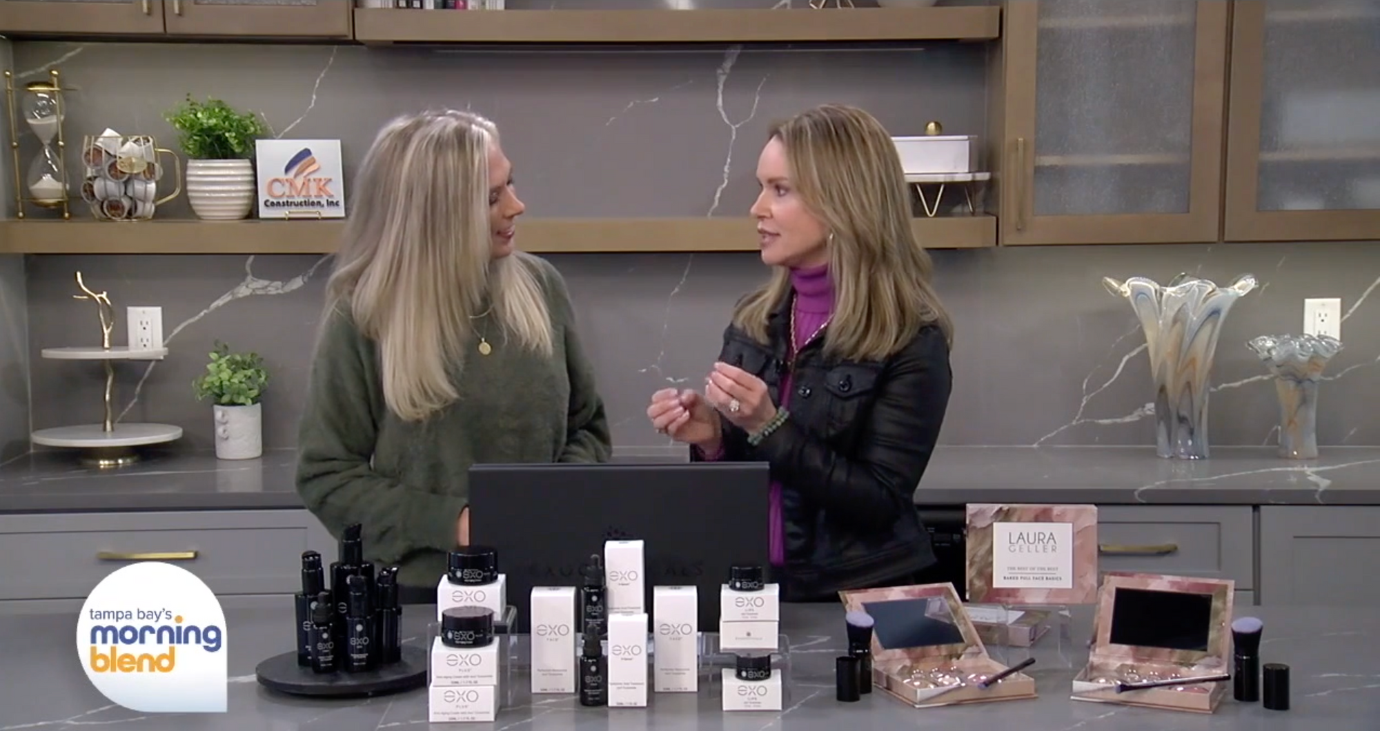 Screenshot from video titled 'Beauty Expert Michelle Phillips Highlighting Her Top 3 Exoceutical Products' showing two women discussing skincare.