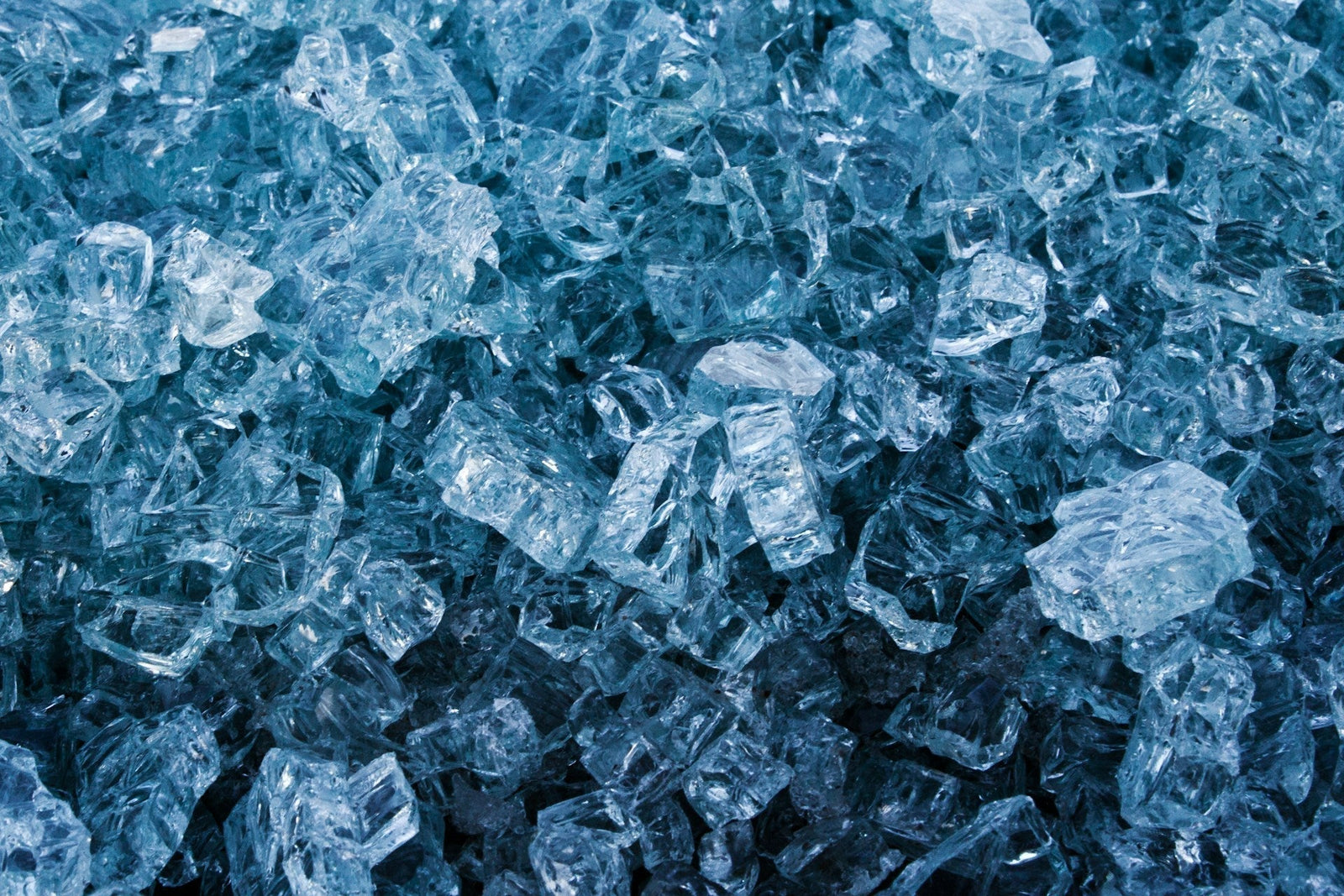 Crushed ice photographed up close — visually representing the cooling, inflammation-reducing benefits of ice in skincare routines